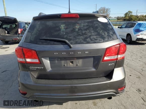 ✅ 2017 Dodge Journey SXT • VIN: 3C4PDDBG5HT592899 • Лот: 89541635. Опубликован ранее на Copart с пробегом 141 136 миль. Бесплатный доступ к архиву аукционных продаж из США и подробный отчёт об истории автомобиля на DreamBid. Изображение 6.