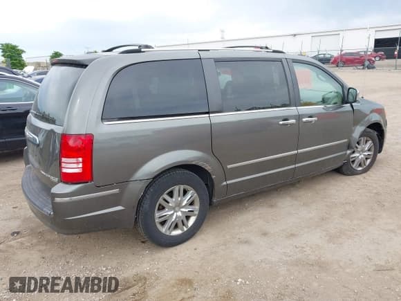 ✅ 2010 Chrysler Town & Country Limited • VIN: 2A4RR7DX2AR451719 • Lot: 42351759. Wystawiony na IAAI z przebiegiem 163 635 mil. Bezpłatny archiwum sprzedaży aukcyjnych z USA i szczegółowy raport historii pojazdu na DreamBid. Zdjęcie 4.