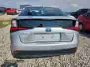 2021 Toyota Prius L Eco with VIN JTDKAMFU1M3150517, listed as a Copart auction lot 70697765 with 107,800 mi miles and Salvage title. Bid and sale history available at DreamBid. Image 6.