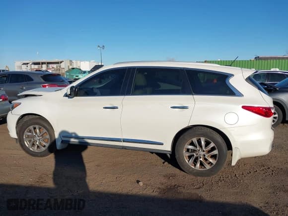 ✅ 2015 Infiniti QX60 • VIN: 5N1AL0MM9FC530723 • Lot: 43705134. Listed on IAAI with 102,790 mi. Free auction sales archive from the USA and detailed vehicle history report at DreamBid. Image 14.