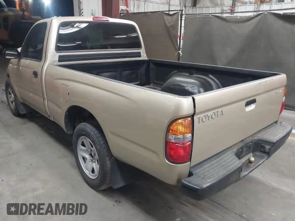 ✅ 2004 Toyota Tacoma • VIN: 5TENL42N74Z385687 • Lot: 42140317. Listed on IAAI with 218,595 mi. Free auction sales archive from the USA and detailed vehicle history report at DreamBid. Image 3.
