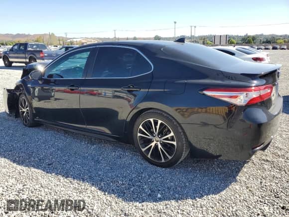 2020 Toyota Camry Hybrid SE z VIN 4T1J31AK4LU016891, wystawiony jako Copart lot #84918825 z przebiegiem 105 428 mil mil oraz Szkoda całkowita • Salvage title. Historia ofert i sprzedaży dostępna na DreamBid. Obrazek 2.