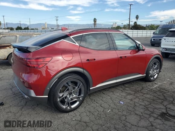 ✅ 2023 Genesis GV60 Performance • VIN: KMUKEDTBXPU008802 • Lot: 90053065. Listed on Copart with 22,538 mi. Free auction sales archive from the USA and detailed vehicle history report at DreamBid. Image 3.