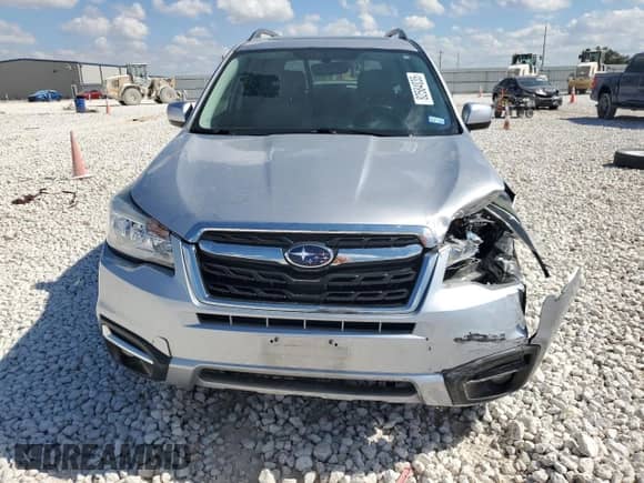 2017 Subaru Forester Limited with VIN JF2SJALC7HH442418, listed as a Copart auction lot 82584035 with 57,114 mi miles and Salvage title. Bid and sale history available at DreamBid. Image 5.