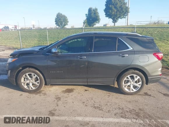 ✅ 2020 Chevrolet Equinox Premier • VIN: 3GNAXNEV9LS671723 • Lot: 43576549. Wystawiony na IAAI z przebiegiem 71 876 mil. Bezpłatny archiwum sprzedaży aukcyjnych z USA i szczegółowy raport historii pojazdu na DreamBid. Zdjęcie 14.
