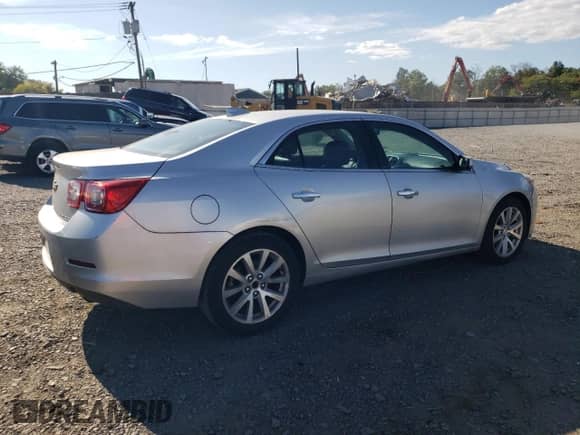 2015 Chevrolet Malibu LTZ с VIN 1G11F5SL1FU127504, выставлен на аукционе Copart как лот 69595005 с пробегом 85 589 миль миль и Списание • Salvage title. История ставок и продаж доступна на DreamBid. Изображение 3.