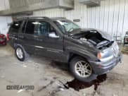 ✅ 2002 Jeep Grand Cherokee Laredo • VIN: 1J4GW48N92C321356 • Lot: 67315825. Listed on Copart with 112,829 mi. Free auction sales archive from the USA and detailed vehicle history report at DreamBid. Image 4.