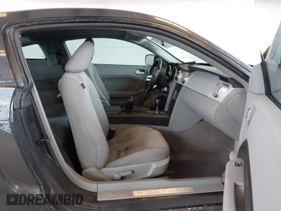 ✅ 2007 Ford Mustang Deluxe • VIN: 1ZVHT80NX75349309 • Lot: 43716028. Listed on IAAI with 148,642 mi. Free auction sales archive from the USA and detailed vehicle history report at DreamBid. Image 5.