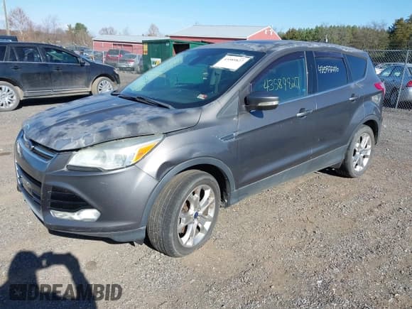 ✅ 2013 Ford Escape SEL • VIN: 1FMCU9H94DUD25804 • Lot: 43589827. Listed on IAAI with 134,696 mi. Free auction sales archive from the USA and detailed vehicle history report at DreamBid. Image 2.