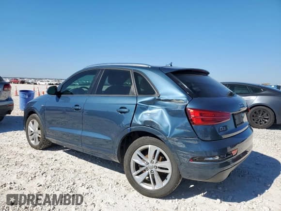 ✅ 2018 Audi Q3 Premium • VIN: WA1BCCFS0JR002719 • Лот: 90874345. Опубликован ранее на Copart с пробегом 44 379 миль. Бесплатный доступ к архиву аукционных продаж из США и подробный отчёт об истории автомобиля на DreamBid. Изображение 2.