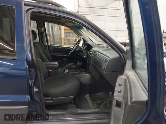 ✅ 2003 Jeep Grand Cherokee Laredo • VIN: 1J4GW48S63C545000 • Lot: 43551112. Listed on IAAI with 290,518 mi. Free auction sales archive from the USA and detailed vehicle history report at DreamBid. Image 5.