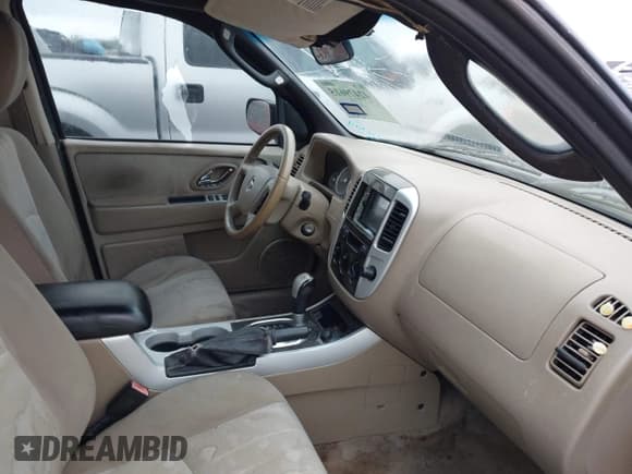 ✅ 2007 Mercury Mariner Convenience • VIN: 4M2YU80Z57KJ13939 • Lot: 42479615. Listed on IAAI with 238,493 mi. Free auction sales archive from the USA and detailed vehicle history report at DreamBid. Image 5.