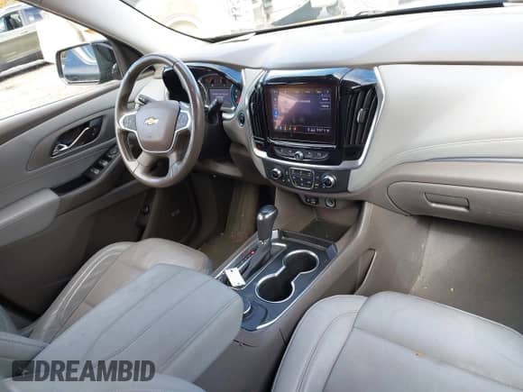 2020 Chevrolet Traverse LT z VIN 1GNEVHKW3LJ106407, wystawiony jako IAAI lot #43463464 z przebiegiem 103 973 mil mil oraz . Historia ofert i sprzedaży dostępna na DreamBid. Obrazek 5.