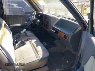 1992 Dodge Dakota SLT z VIN 1B7FL26X9NS643377, wystawiony jako IAAI lot #42844829 z przebiegiem 191 961 mil mil oraz . Historia ofert i sprzedaży dostępna na DreamBid. Obrazek 5.