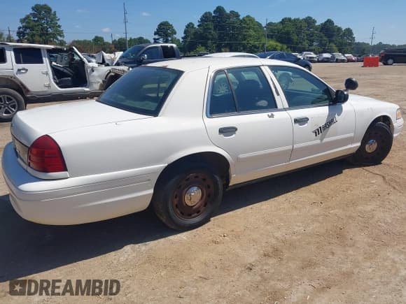 ✅ 2003 Ford Police Interceptor Street Appear • VIN: 2FAHP71W23X179762 • Lot: 42802650. Listed on IAAI with 107,635 mi. Free auction sales archive from the USA and detailed vehicle history report at DreamBid. Image 4.