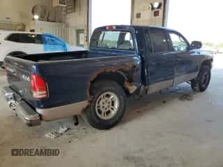 2000 Dodge Dakota Sport с VIN 1B7GG2AN8YS722350, выставлен на аукционе Copart как лот 69377984 с пробегом 199 883 миль миль и Списание • Salvage title. История ставок и продаж доступна на DreamBid. Изображение 3.