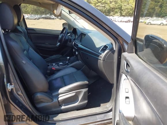 ✅ 2016 Mazda CX-5 Grand Touring • VIN: JM3KE2DYXG0769581 • Lot: 43174558. Listed on IAAI with 206,517 mi. Free auction sales archive from the USA and detailed vehicle history report at DreamBid. Image 5.