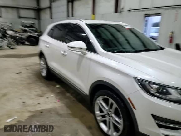 ✅ 2016 Lincoln MKC Reserve • VIN: 5LMTJ3DH6GUJ12308 • Lot: 82084425. Listed on Copart with 127,554 mi. Free auction sales archive from the USA and detailed vehicle history report at DreamBid. Image 14.
