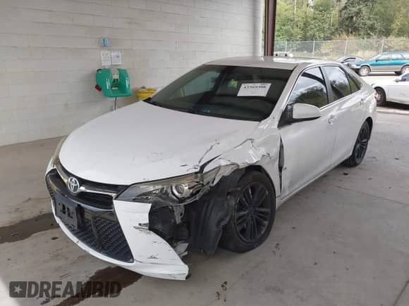 2016 Toyota Camry LE z VIN 4T1BF1FK8GU245813, wystawiony jako IAAI lot #43369308 z przebiegiem 97 361 mil mil oraz . Historia ofert i sprzedaży dostępna na DreamBid. Obrazek 18.