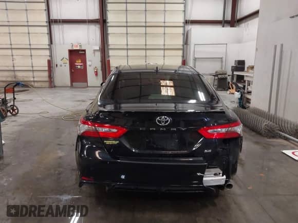 2019 Toyota Camry LE with VIN JTNB11HK0K3080138, listed as a IAAI auction lot 43236866 with 98,032 mi miles and . Bid and sale history available at DreamBid. Image 17.