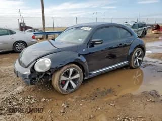 ✅ 2014 Volkswagen Beetle Turbo R-Line • VIN: 3VWVS7AT2EM615023 • Лот: 82318335. Опубликован ранее на Copart с пробегом 72 517 миль. Бесплатный доступ к архиву аукционных продаж из США и подробный отчёт об истории автомобиля на DreamBid. Изображение 1.
