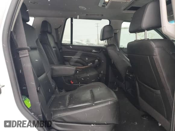 2020 Chevrolet Tahoe Premier with VIN 1GNSKCKJXLR182971, listed as a Copart auction lot 87268634 with 210,000 mi miles and Salvage title. Bid and sale history available at DreamBid. Image 12.