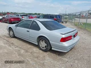 ✅ 1994 Ford Thunderbird • VIN: 1FALP64R8RH171278 • Лот: 43039473. Опубликован ранее на IAAI с пробегом 142 035 миль. Бесплатный доступ к архиву аукционных продаж из США и подробный отчёт об истории автомобиля на DreamBid. Изображение 3.