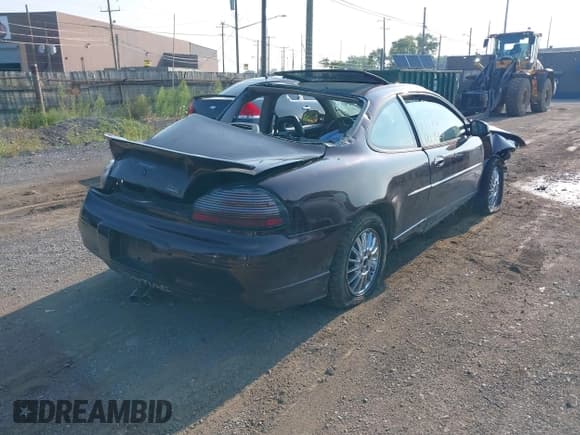 ✅ 2002 Pontiac Grand Prix GTP • VIN: 1G2WR121X2F213750 • Lot: 42981975. Listed on IAAI with 156,049 mi. Free auction sales archive from the USA and detailed vehicle history report at DreamBid. Image 4.