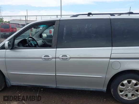 ✅ 2004 Honda Odyssey EX-L • VIN: 5FNRL18764B036904 • Lot: 42212028. Wystawiony na IAAI z przebiegiem 146 875 mil. Bezpłatny archiwum sprzedaży aukcyjnych z USA i szczegółowy raport historii pojazdu na DreamBid. Zdjęcie 14.