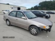 ✅ 1999 Toyota Corolla LE • VIN: 1NXBR12E6XZ148570 • Лот: 81554415. Опубликован ранее на Copart с пробегом 264 960 миль. Бесплатный доступ к архиву аукционных продаж из США и подробный отчёт об истории автомобиля на DreamBid. Изображение 4.