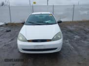 ✅ 2003 Ford Focus LX • VIN: 1FAFP33PX3W181700 • Lot: 41910086. Listed on IAAI with 139,777 mi. Free auction sales archive from the USA and detailed vehicle history report at DreamBid. Image 12.