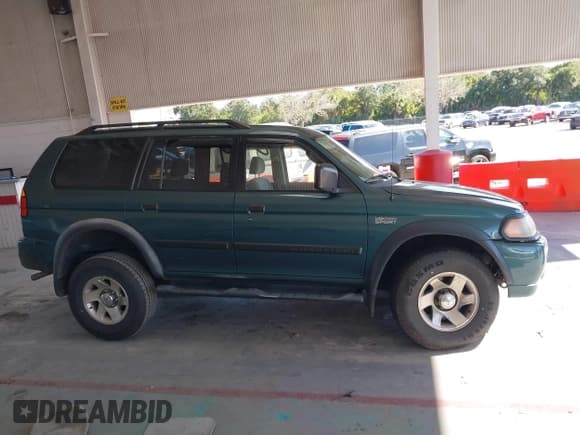 ✅ 2003 Mitsubishi Montero Sport ES • VIN: JA4LS21H43J017853 • Lot: 43700380. Listed on IAAI with 197,065 mi. Free auction sales archive from the USA and detailed vehicle history report at DreamBid. Image 13.