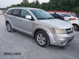 ✅ 2012 Dodge Journey SXT • VIN: 3C4PDCBBXCT323532 • Lot: 42471610. Listed on IAAI with 188,103 mi. Free auction sales archive from the USA and detailed vehicle history report at DreamBid. Image 1.