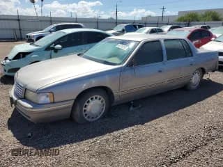 ✅ 1997 Cadillac DeVille • VIN: 1G6KD54Y1VU244446 • Lot: 80716295. Listed on Copart with Not provided. Free auction sales archive from the USA and detailed vehicle history report at DreamBid. Image 1.