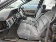 ✅ 1991 Chevrolet Caprice • VIN: 1G1BN53E1MW223013 • Лот: 49857604. Опубликован ранее на Copart с пробегом 224 278 миль. Бесплатный доступ к архиву аукционных продаж из США и подробный отчёт об истории автомобиля на DreamBid. Изображение 7.