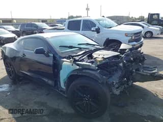 ✅ 2016 Chevrolet Camaro 2LT • VIN: 1G1FD1RS5G0130870 • Lot: 43515352. Listed on IAAI with 123,743 mi. Free auction sales archive from the USA and detailed vehicle history report at DreamBid. Image 1.