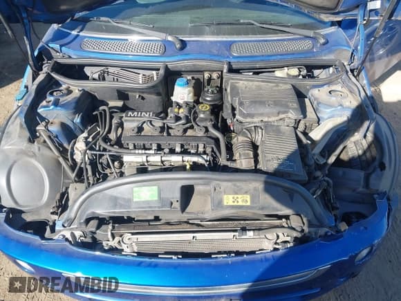 ✅ 2006 MINI Convertible • VIN: WMWRF33576TG14873 • Lot: 43592857. Listed on IAAI with 104,184 mi. Free auction sales archive from the USA and detailed vehicle history report at DreamBid. Image 10.