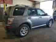 2010 Mercury Mariner Premier с VIN 4M2CN9H72AKJ30043, выставлен на аукционе Copart как лот 71597515 с пробегом 181 857 миль миль и Списание • Salvage title. История ставок и продаж доступна на DreamBid. Изображение 3.