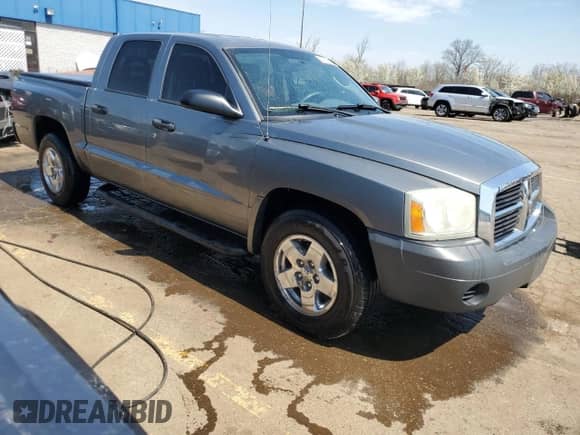 2005 Dodge Dakota ST с VIN 1D7HE28K05S223999, выставлен на аукционе Copart как лот 54133785 с пробегом 212 687 миль миль и Чистый • Clean title. История ставок и продаж доступна на DreamBid. Изображение 4.
