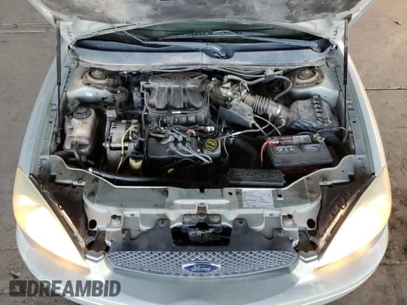 ✅ 2004 Ford Taurus SE • VIN: 1FAFP53294A215463 • Lot: 89672625. Wystawiony na Copart z przebiegiem 123 964 mil. Bezpłatny archiwum sprzedaży aukcyjnych z USA i szczegółowy raport historii pojazdu na DreamBid. Zdjęcie 11.