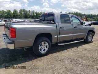 2007 Dodge Dakota SLT с VIN 1D7HW48KX7S256455, выставлен на аукционе Copart как лот 62001464 с пробегом 109 239 миль миль и Списание • Salvage title. История ставок и продаж доступна на DreamBid. Изображение 3.