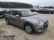 ✅ 2017 MINI Hardtop 4 Door Cooper • VIN: WMWXU1C51H2E17627 • Лот: 90085175. Опубликован ранее на Copart с пробегом 62 148 миль. Бесплатный доступ к архиву аукционных продаж из США и подробный отчёт об истории автомобиля на DreamBid. Изображение 4.