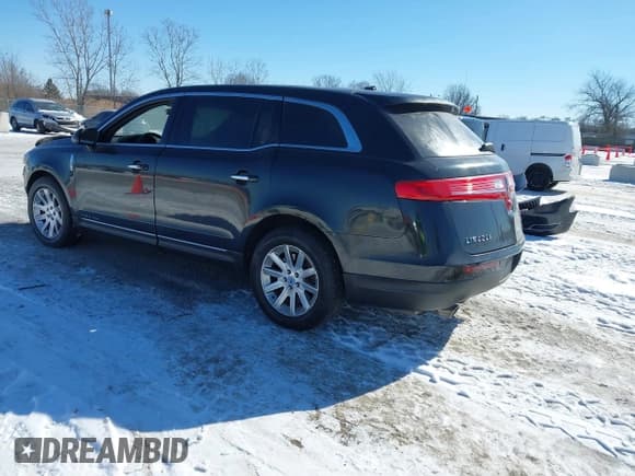 ✅ 2013 Lincoln MKT • VIN: 2LMHJ5NK8DBL51461 • Lot: 41554302. Listed on IAAI with 150,931 mi. Free auction sales archive from the USA and detailed vehicle history report at DreamBid. Image 3.