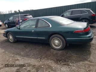 ✅ 1993 Lincoln Mark VIII • VIN: 1LNLM91V6PY718157 • Лот: 49493195. Опубликован ранее на Copart с пробегом 129 889 миль. Бесплатный доступ к архиву аукционных продаж из США и подробный отчёт об истории автомобиля на DreamBid. Изображение 2.