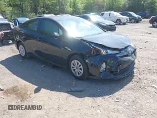 ✅ 2022 Toyota Prius L Eco • VIN: JTDKAMFU1N3182790 • Lot: 41993264. Listed on IAAI with 124,777 mi. Free auction sales archive from the USA and detailed vehicle history report at DreamBid. Image 1.