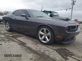 ✅ 2013 Dodge Challenger SXT • VIN: 2C3CDYAG8DH649241 • Lot: 84481184. Wystawiony na Copart z przebiegiem 196 966 mil. Bezpłatny archiwum sprzedaży aukcyjnych z USA i szczegółowy raport historii pojazdu na DreamBid. Zdjęcie 4.