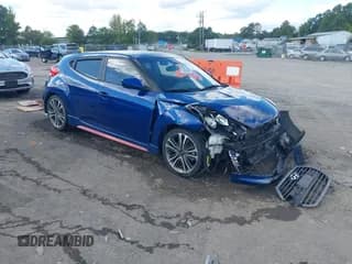 ✅ 2016 Hyundai Veloster Turbo • VIN: KMHTC6AE2GU275272 • Lot: 43344485. Wystawiony na IAAI z przebiegiem 99 825 mil. Bezpłatny archiwum sprzedaży aukcyjnych z USA i szczegółowy raport historii pojazdu na DreamBid. Zdjęcie 1.