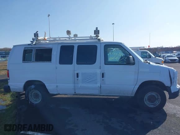 ✅ 2013 Ford Econoline Cargo Commercial • VIN: 1FTNE2EL1DDB27599 • Lot: 41878865. Listed on IAAI with 179,802 mi. Free auction sales archive from the USA and detailed vehicle history report at DreamBid. Image 13.