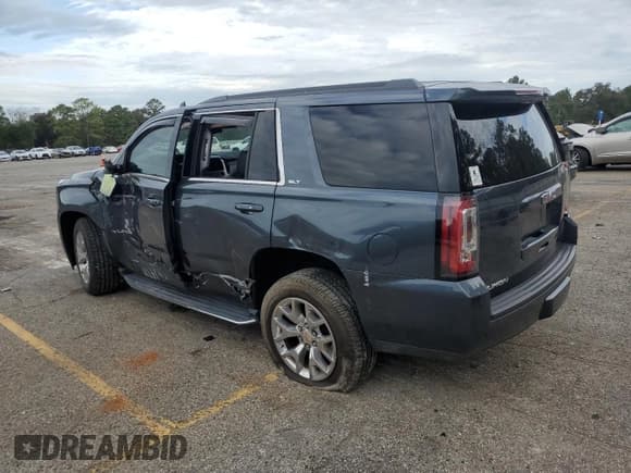 ✅ 2019 GMC Yukon SLT • VIN: 1GKS1BKC1KR325235 • Lot: 85153165. Listed on Copart with 86,559 mi. Free auction sales archive from the USA and detailed vehicle history report at DreamBid. Image 2.