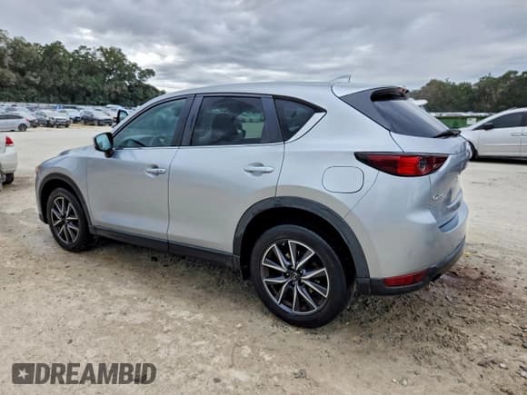 ✅ 2018 Mazda CX-5 Touring • VIN: JM3KFACM9J0348139 • Lot: 94654405. Wystawiony na Copart z przebiegiem 182 098 mil. Bezpłatny archiwum sprzedaży aukcyjnych z USA i szczegółowy raport historii pojazdu na DreamBid. Zdjęcie 2.